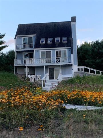 front view picture of 5736 Greenwood Road, Gladwin, MI. 48624