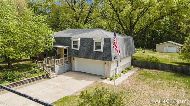 front view picture of 6458 Tamarack Drive, Fruitport, MI. 49415
