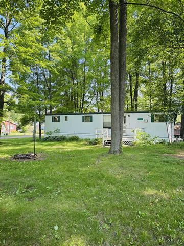 front view picture of 5340 Birch Island Drive, Barryton, MI. 49305
