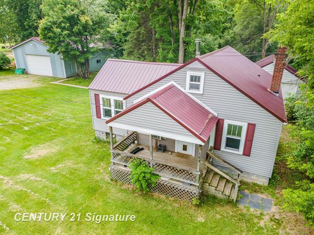 front view picture of 125 N Homer Road, Midland, MI. 48640