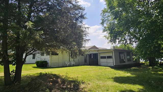 front view picture of 2275 Tamarack Street, Lake Odessa, MI. 48849