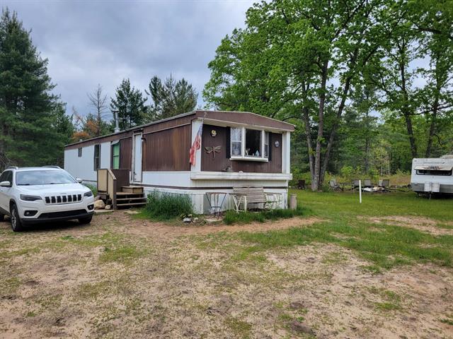 front view picture of 4540 Chalker Road, Wellston, MI. 49689