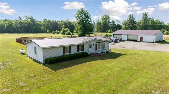front view picture of 8031 Vassar Road, Millington, MI. 48746