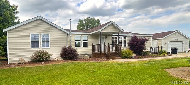 front view picture of 8327 Wilcox Road, Brown City, MI. 48416
