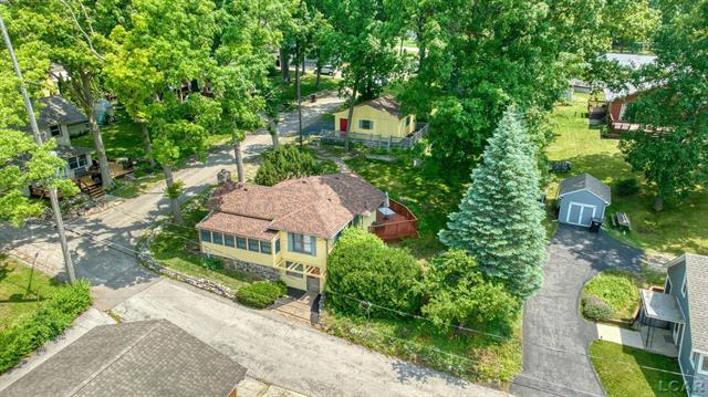 front view picture of 5027 Bellemere Court, Manitou Beach, MI. 49253
