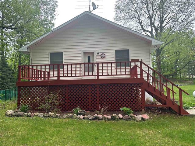front view picture of 142 Forest Trail, Leroy, MI. 49655