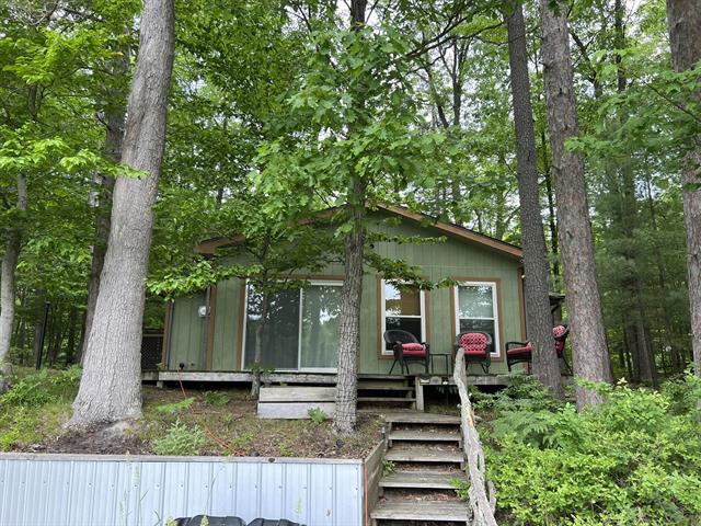 front view picture of 5103 N Waite Drive Drive, Irons, MI. 49644