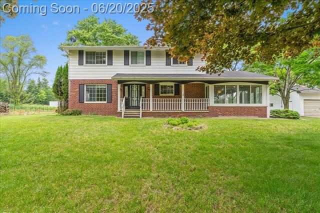 front view picture of 360 Wood Creek Drive, Howell, MI. 48843
