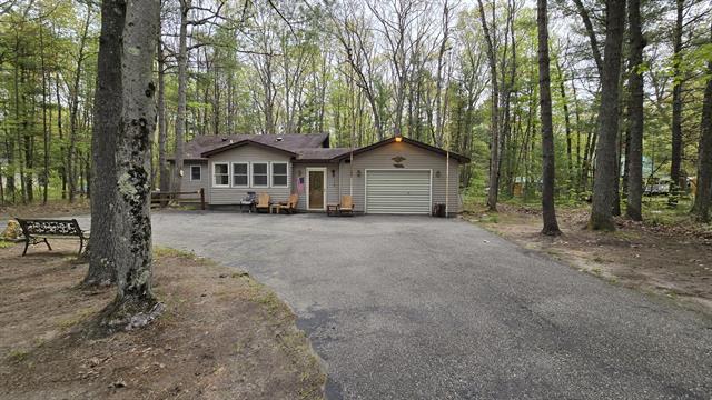 front view picture of 211 Skocelas Road N, Manistee, MI. 49660