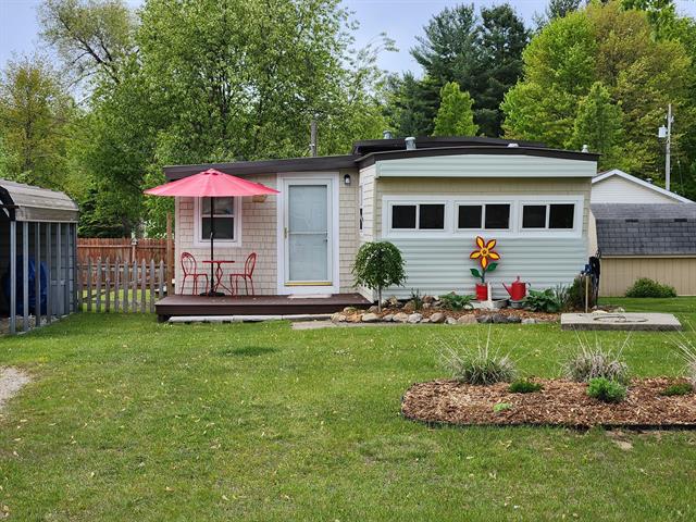 front view picture of 10438 Hunters Trail, Lake, MI. 48632