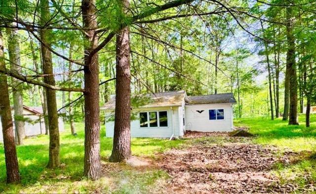 front view picture of 751 Bungo Lake Road, Harrison, MI. 48625