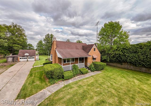 front view picture of 11660 Telegraph Road, Carleton, MI. 48117