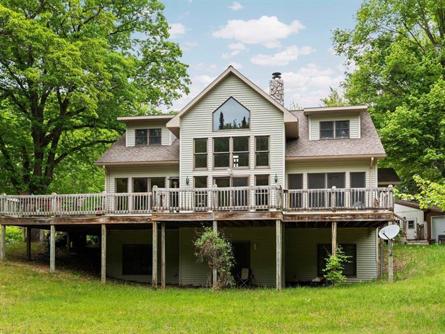 front view picture of 8415 W Workman Road, Lake City, MI. 49651