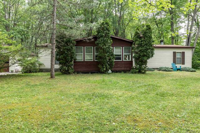 front view picture of 5665 N Sturgeon Road, Gladwin, MI. 48624