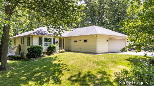front view picture of 5151 Scotch Mist Drive, Saranac, MI. 48881