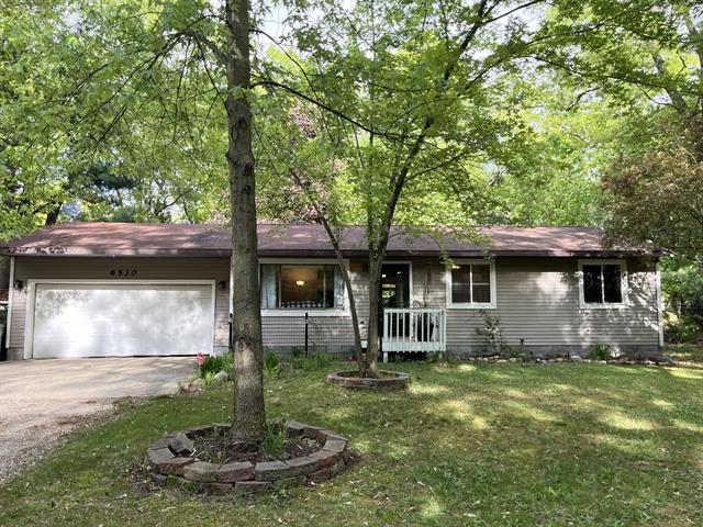 front view picture of 6530 Blue Lake Road, Twin Lake, MI. 49457