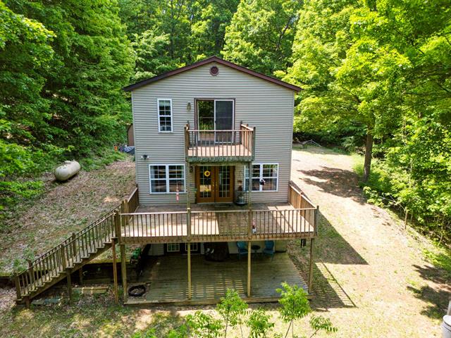 front view picture of 3721 W 18 Road, Mesick, MI. 49668