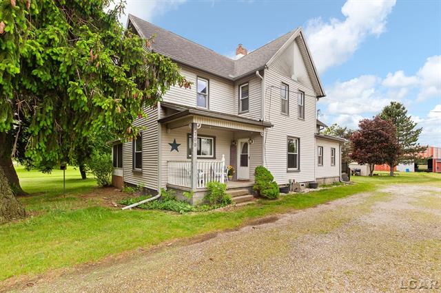 front view picture of 5700 N Raisin Center Highway, Tecumseh, MI. 49286