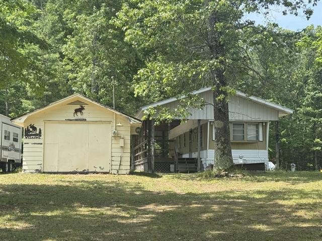 front view picture of 5859 N Utter Road, Irons, MI. 49644