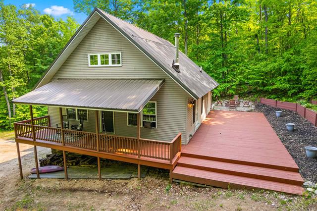 front view picture of 9304 Tower Road, Kalkaska, MI. 49646