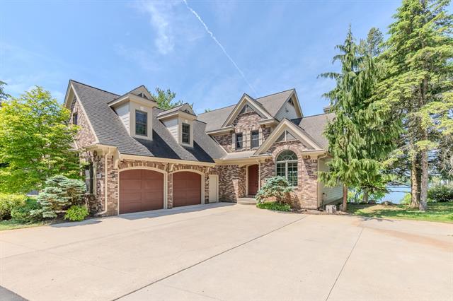 front view picture of 267 Glazier Road, Chelsea, MI. 48118