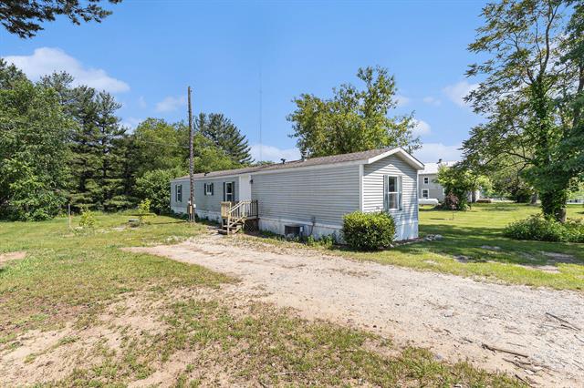 front view picture of 3216 E Stage Road, Ionia, MI. 48846