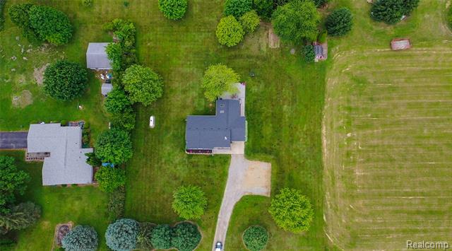 front view picture of 6454 S State Road, Bancroft, MI. 48414