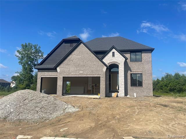 front view picture of 56703 Cortona Drive, Macomb, MI. 48042