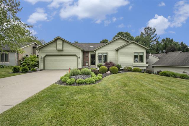 front view picture of 836 Meadowmeade Drive Se, Ada, MI. 49301