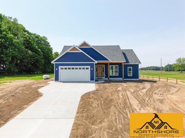 front view picture of 3973 W Harrison Road, Hart, MI. 49420