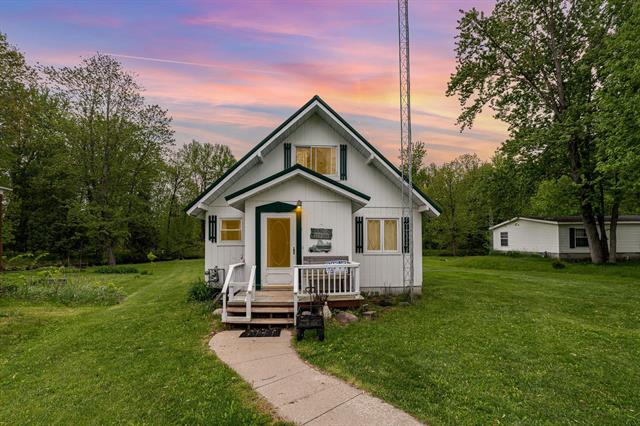 front view picture of 5817 Gross Drive, Weidman, MI. 48893