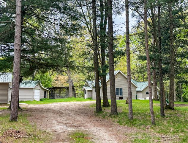 front view picture of 4307 N Mac Road, Irons, MI. 49644