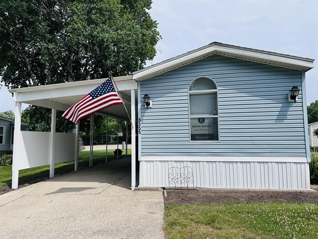 front view picture of 5355 Meadowmoor Drive Ne, Belmont, MI. 49306