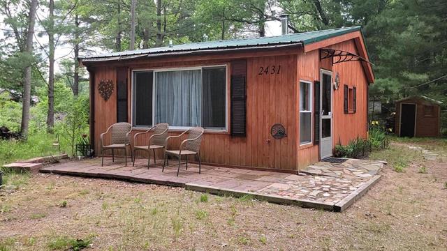 front view picture of 2431 Dodge Lake, Harrison, MI. 48625