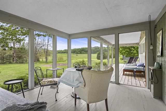 front view picture of 3362 S French Road, Cedar, MI. 49621
