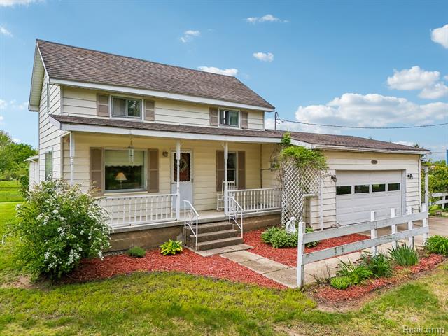 front view picture of 8400 Caine Road, Millington, MI. 48746