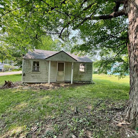 front view picture of 289 Elm Street, Manitou Beach, MI. 49253