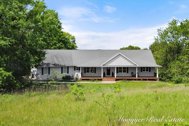 front view picture of 10245 Lincoln Lake Road Ne, Greenville, MI. 48838