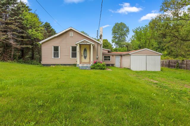 front view picture of 238 Long Avenue, Michigan Center, MI. 49254