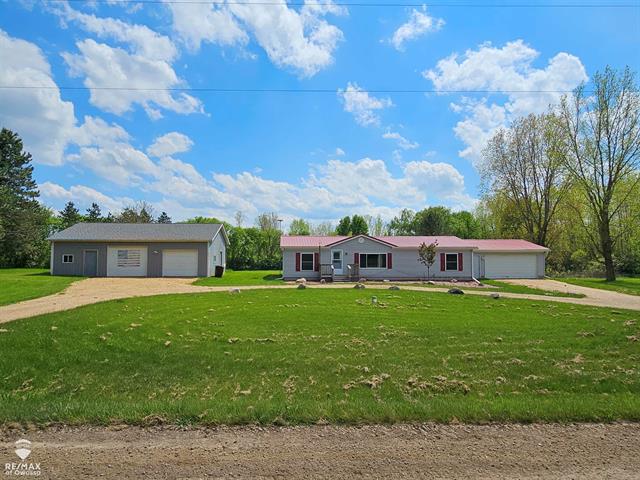 front view picture of 9737 W Mason Road, Ovid, MI. 48866