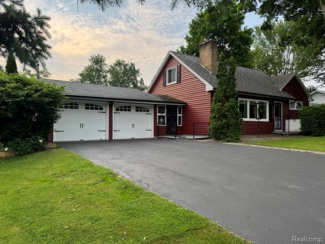front view picture of 426 Renker Road, Lansing, MI. 48917