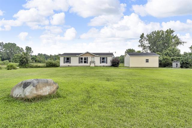 front view picture of 8295 Mccain Road, Parma, MI. 49269