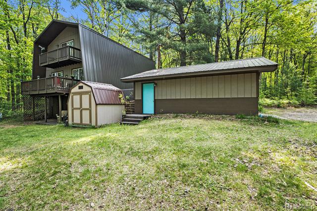 front view picture of 11135 Maple Ridge Way, Roscommon, MI. 48653