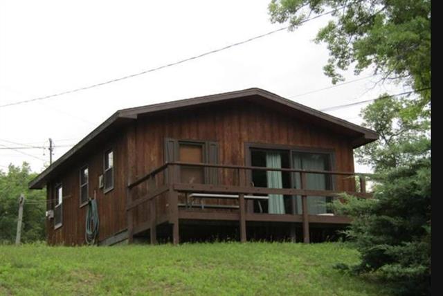 front view picture of 2052 N Ogemaw Trail, West Branch, MI. 48661