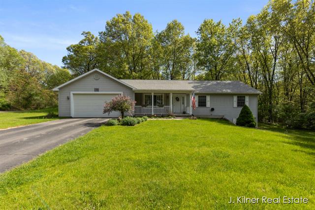 front view picture of 13980 Rolling Creek Drive, Lowell, MI. 49331