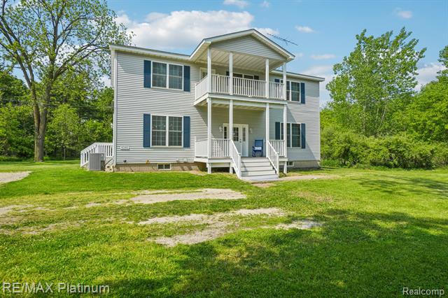 front view picture of 6345 Dean Road, Howell, MI. 48855