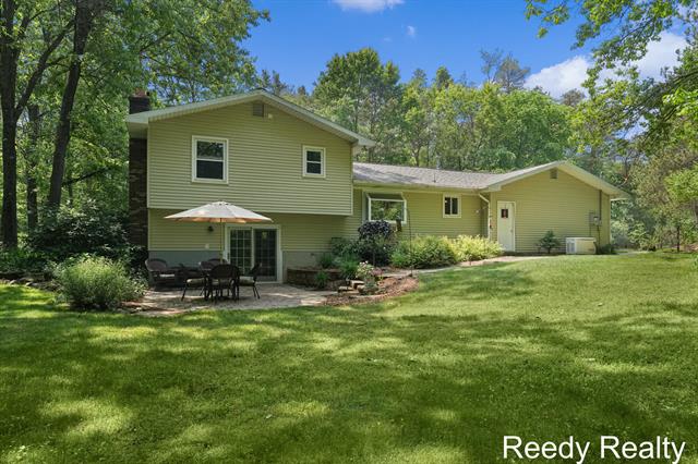 front view picture of 13227 Beckwith Drive Ne, Lowell, MI. 49331