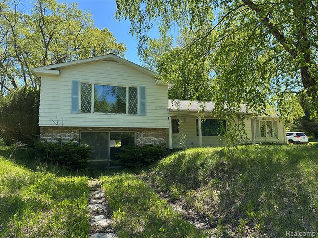 front view picture of 11116 N Bray Road, Clio, MI. 48420