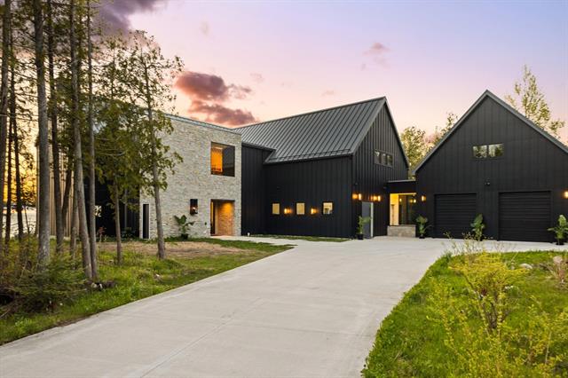 front view picture of 9371 Onominese Trail, Northport, MI. 49670