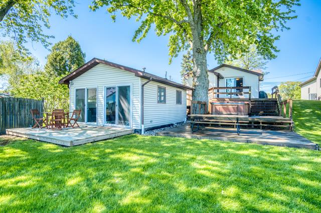 front view picture of 6132 W Houghton Lake Drive, Houghton Lake, MI. 48629